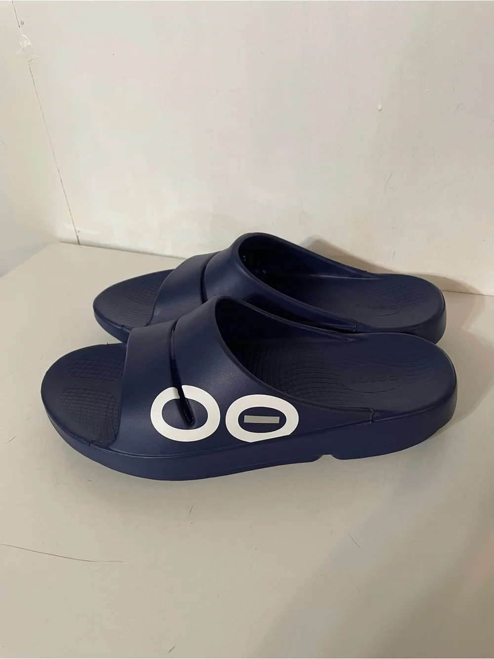 Oofos Slides in Navy Blue